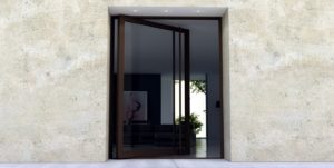 large front door made of glass and bronze with matching door length door hardware