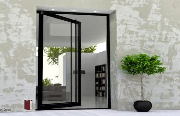 minimalist pivot front door made of black metal and glass with full length black round door pulls
