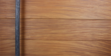 teak wooden front door with unique handcrafted round door handles