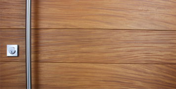 round brushed stainless steel door handle with stainless steel door lock and authentic teak wood