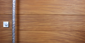 teak wooden front door with fancy round door handles and square stainless steel door lock