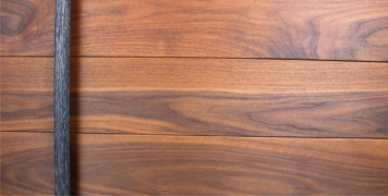 walnut wooden door with round custom modern door hardware