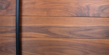 authentic walnut wood door with black powder-coated round door handles