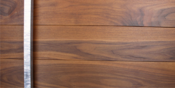 dark wood door made of walnut wood and unique square door handles