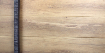 white oak hardwood door with square black door hardware